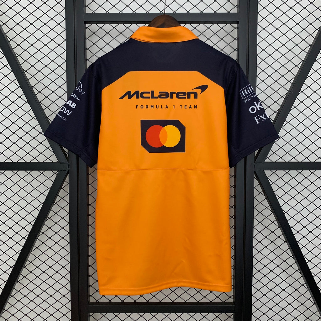 חולצת פורמולה 1 - 2025 Castore McLaren Team פולו