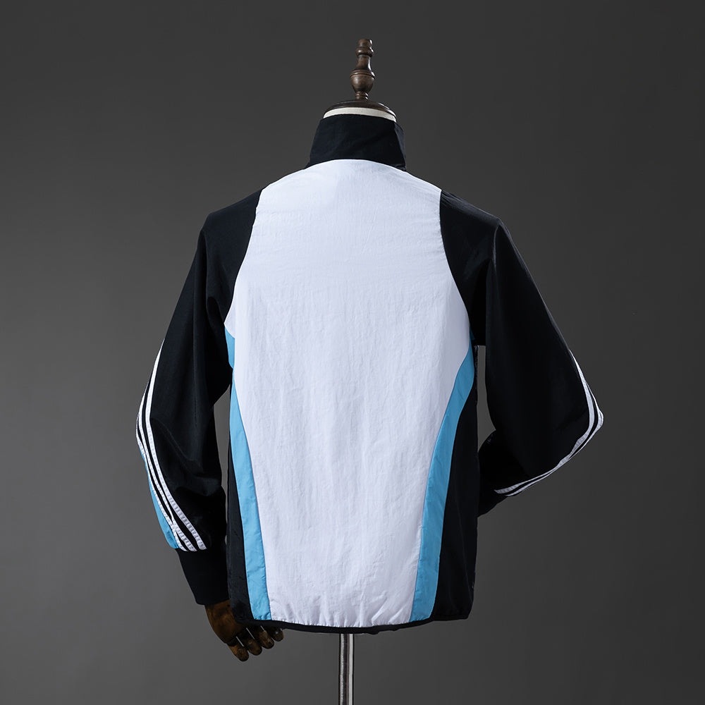 מעיל רוח ריאל מדריד לבנה תכלת 2025/26